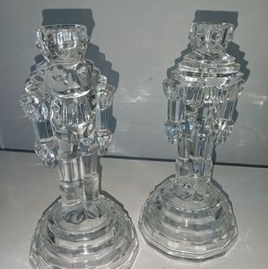 A pair of Crystal nutcracker candlestick holders.